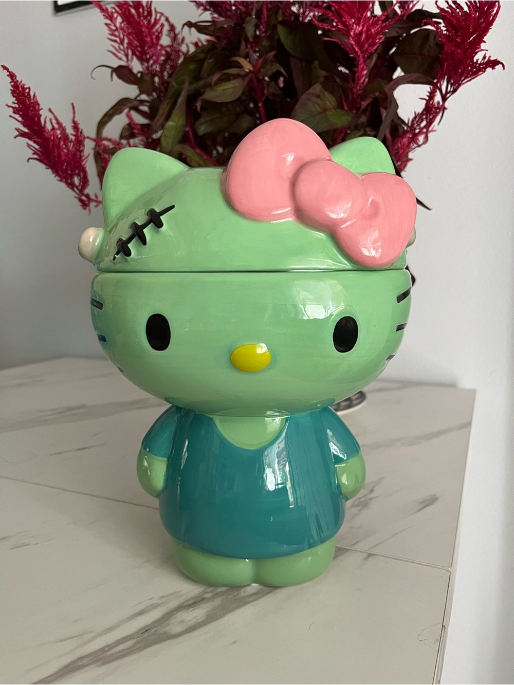 Hello Kitty Green Frankenstein Cookie Jar with Pink Bow - NEW